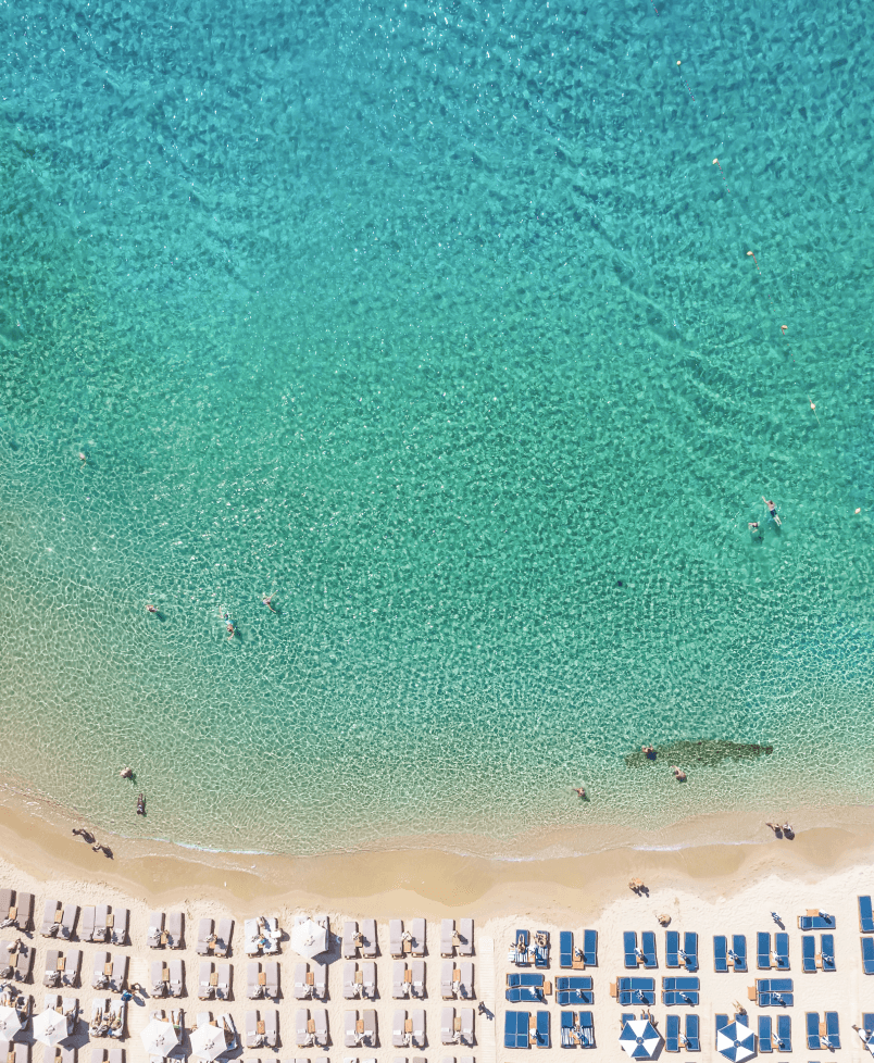 Aegean sea aerial photo portraying a beach on a Greek island