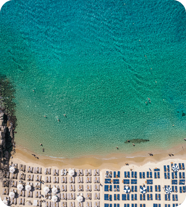 The vibrant beach club scene at Paradise Beach, Mykonos.