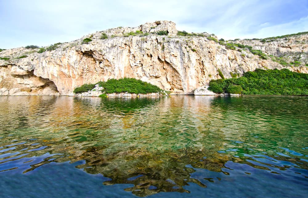 The stunning Vouliagmeni Lake, with its brackish thermal waters and dramatic cliff backdrop.