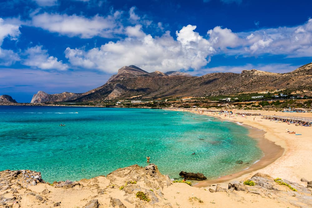 A spectacular sunset over the vast golden sands of Falassarna Beach in western Crete.