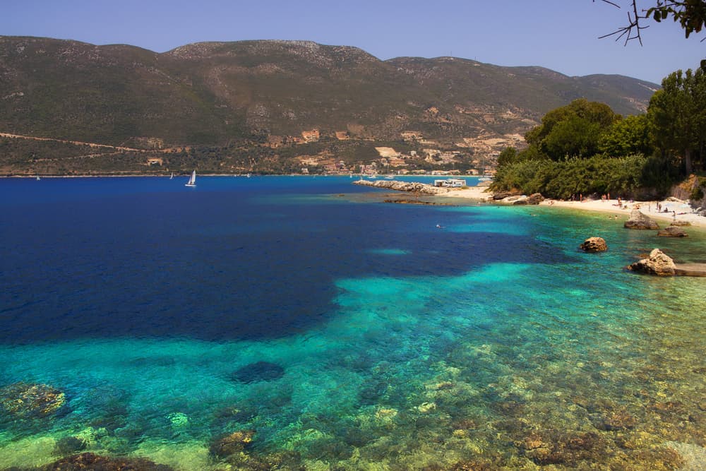 Hundreds of windsurfers gliding across the bay of Vasiliki, Lefkada's windsurfing capital.