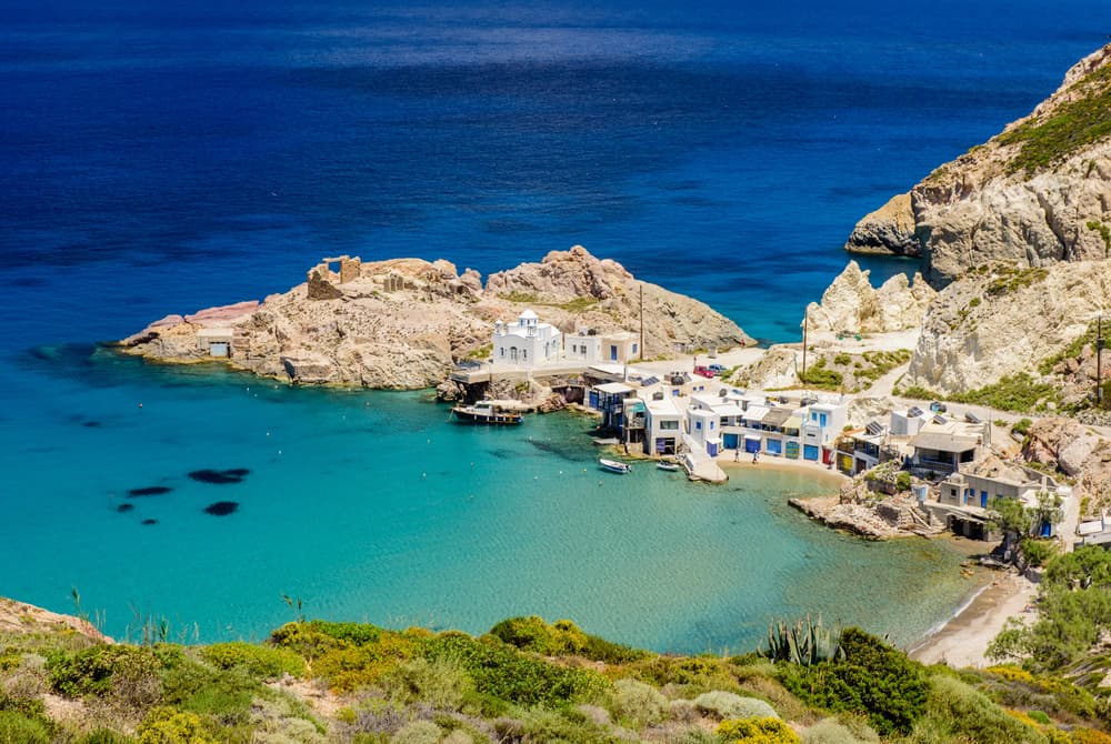 The charming fishing village of Firopotamos, with its traditional 'syrmata' boat houses right on the water's edge.