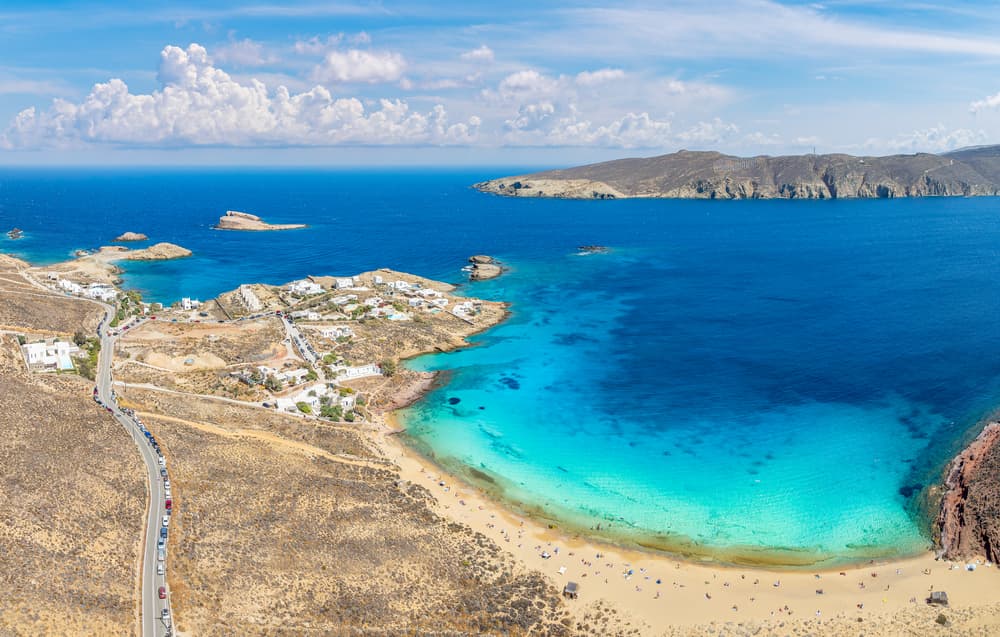 The pristine, undeveloped golden sands of Agios Sostis Beach, Mykonos.