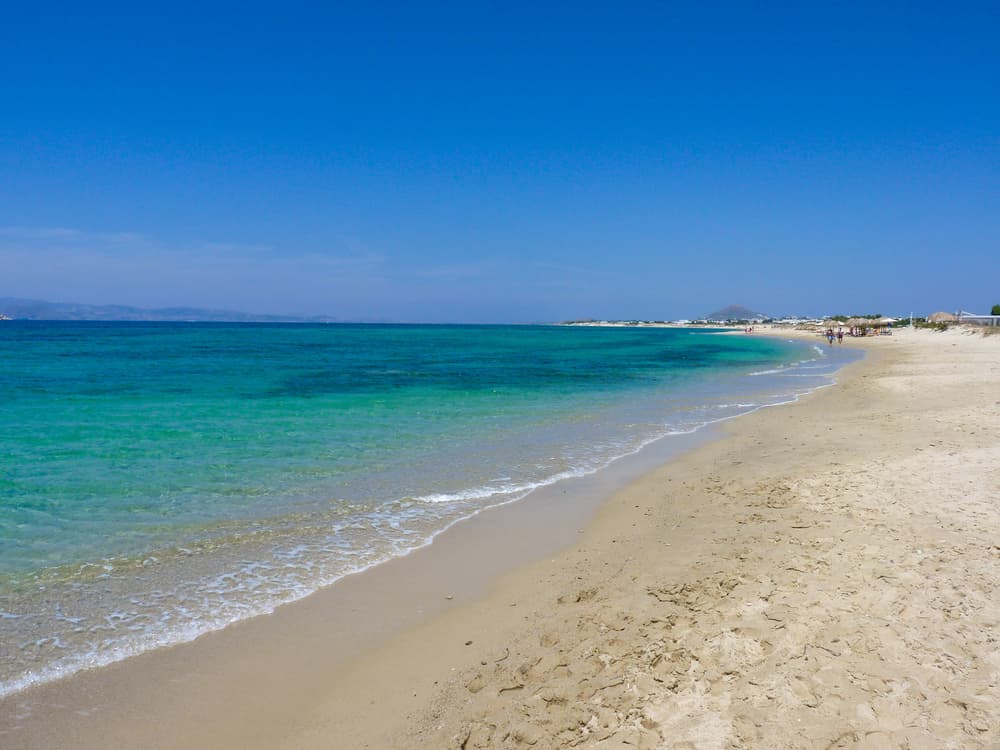The seemingly endless stretch of fine, white sand and dunes at Plaka Beach, Naxos.