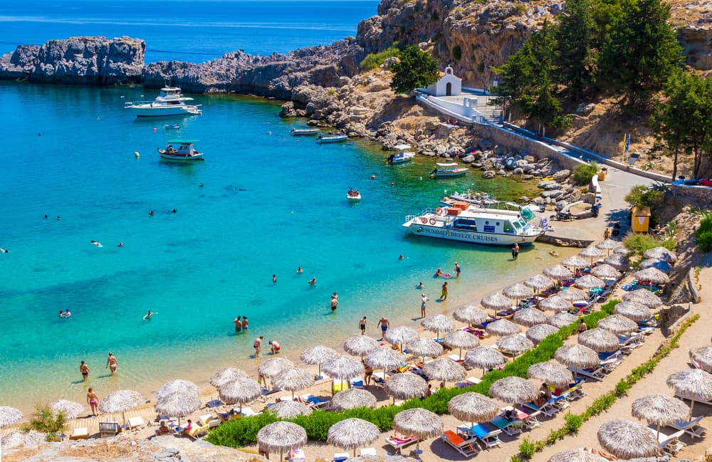 The almost-enclosed, heart-shaped Saint Paul's Bay with its chapel, south of the Lindos Acropolis.