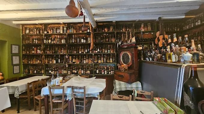 The lively, traditional atmosphere of Taverna Tripa with live music and dancing.