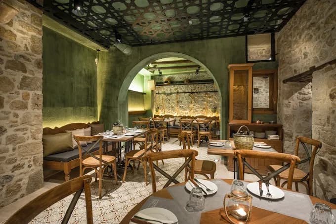 The beautiful, historic interior of Peskesi, an authentic Cretan restaurant in Heraklion.