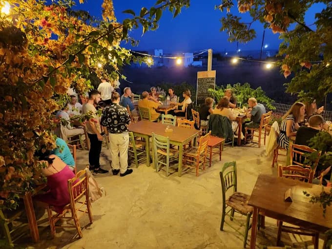 The charming, rustic courtyard of Axiotissa Taverna in Naxos.