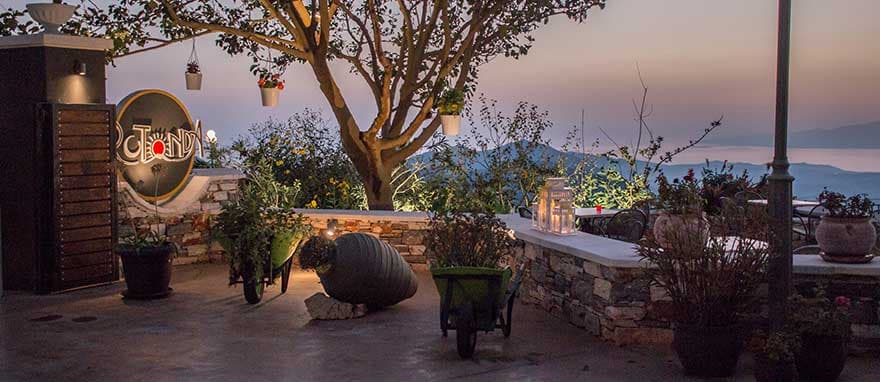 The breathtaking panoramic sunset view from the terrace of Rotonda Restaurant in the mountains of Naxos.
