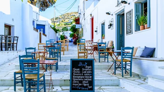 An expertly crafted cocktail on the bar at the stylish and modern Athmar Cocktail Bar.